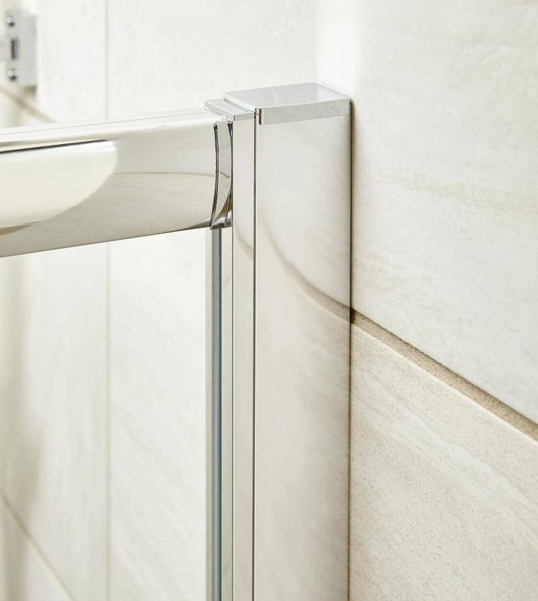 Nuie Pacific sliding quadrant shower enclosure with two doors, polished chrome finish, reversible design, by Tuskan Tiles.