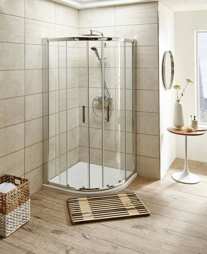 Nuie Pacific sliding quadrant shower enclosure with two doors in polished chrome finish, reversible design, by Tuskan Tiles.