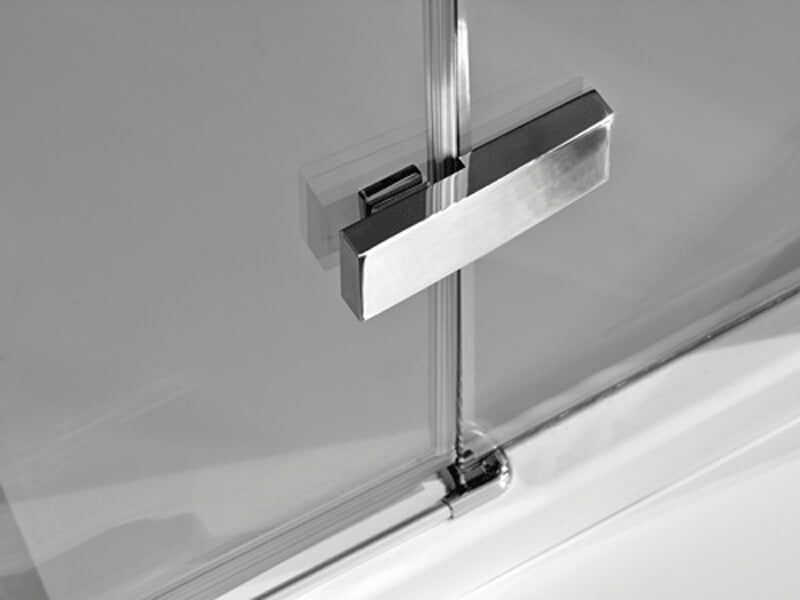 Tuskan Tiles Merlyn Ionic Essence hinged frameless shower door with inline panel, reversible, glass with chrome hardware.
