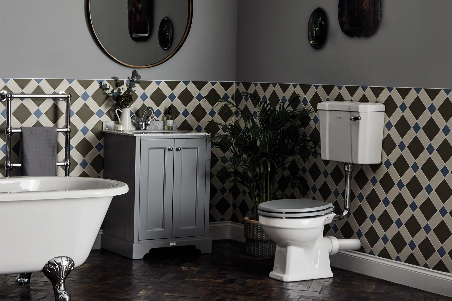 Tuskan Tiles Bayswater Fitzroy comfort height WC pan with open back and low level cistern, measuring 474x515mm, shown with open lid.