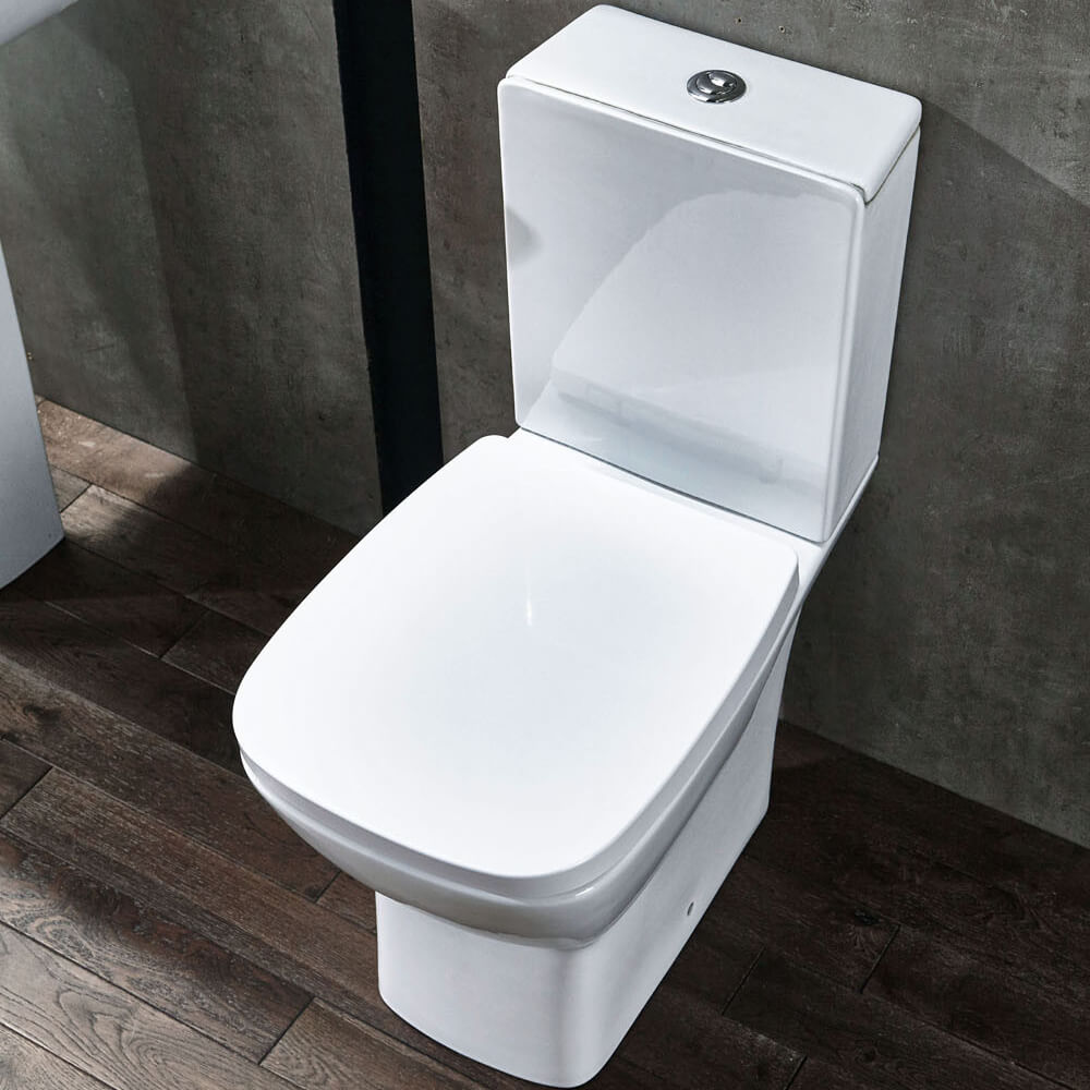 Tuskan Tiles Aqua Piccolo close coupled toilet with soft close seat and cistern, 365 x 625mm, sleek bathroom fixture.