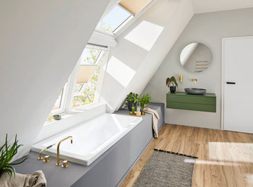 White Tuskan Tiles Kaldewei Avantgarde Conoduo double-ended steel bath, 1700x750mm, shown from side view in a modern bathroom setting.
