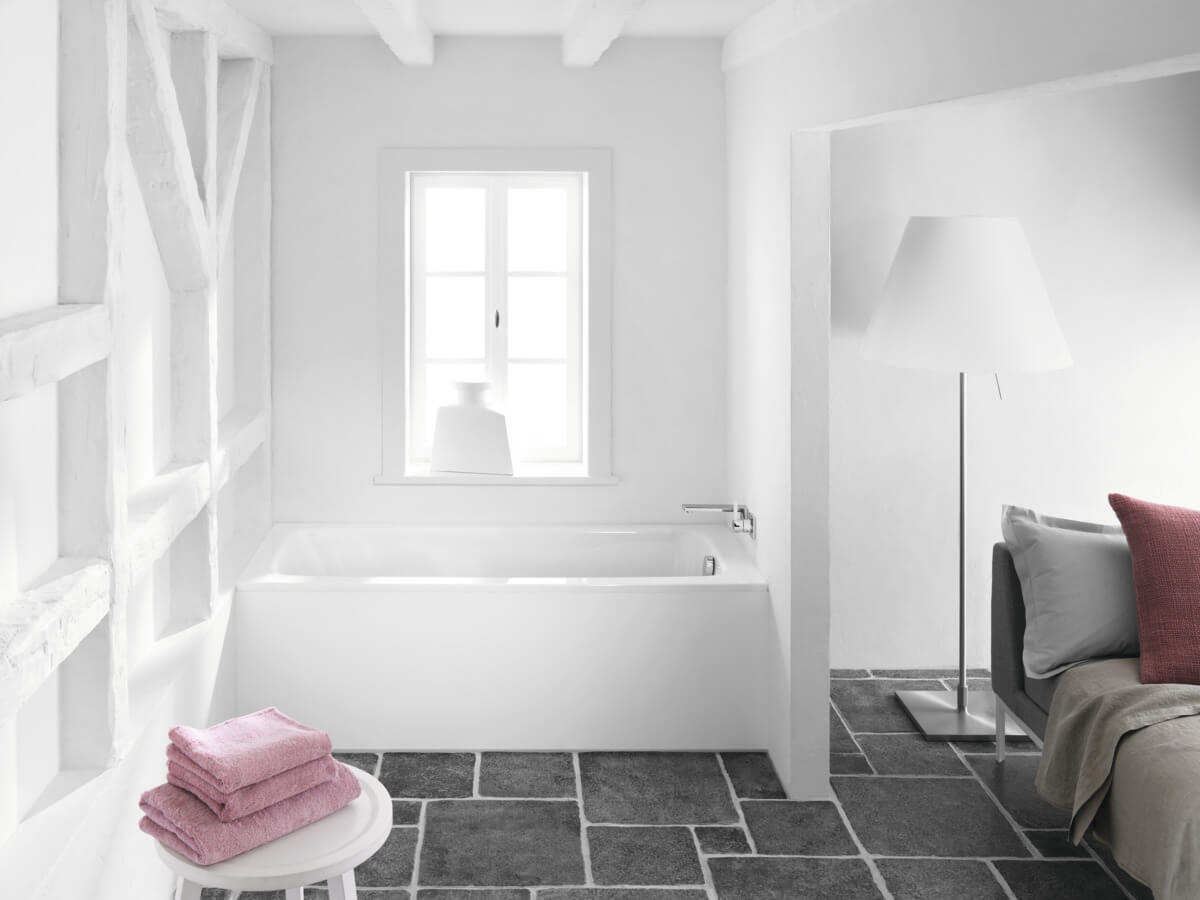 White Kaldewei Advantage Cayono 1700mm steel bath with single-ended design, shown in a modern bathroom setting.