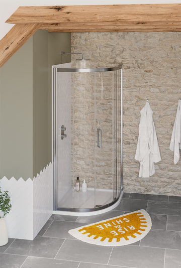 Semi-frameless Lakes Coastline Sorong sliding quadrant shower enclosure by Tuskan Tiles, with clear glass panels and silver frame.