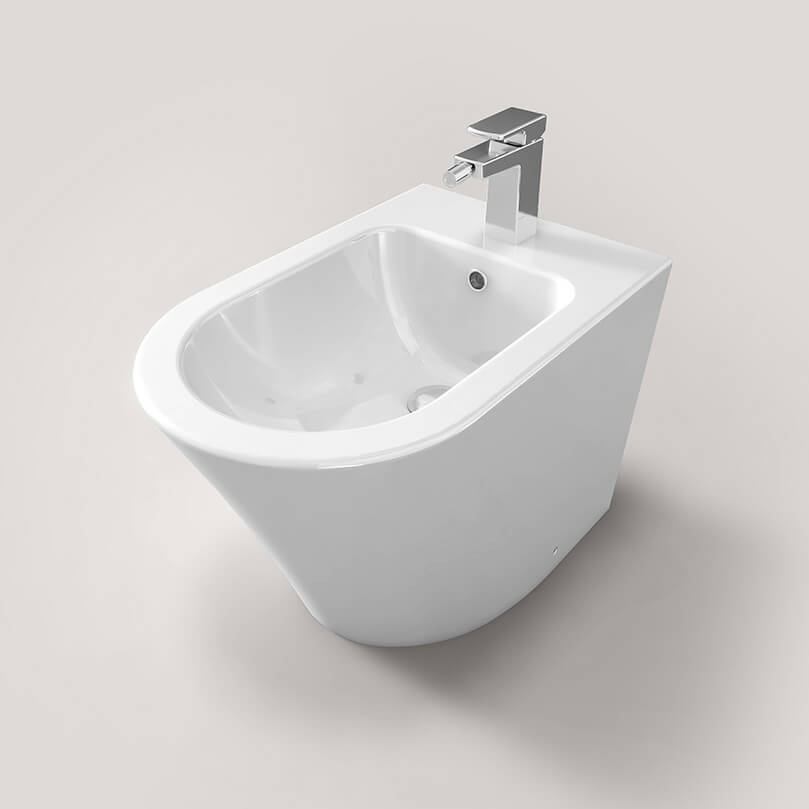 Contemporary white back-to-wall bidet by IMEX Arco with 550mm projection, installed in a modern bathroom setting