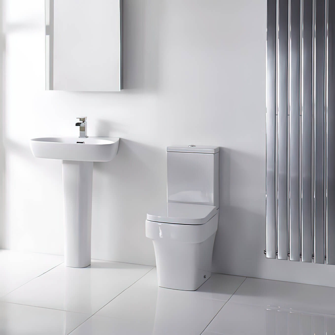 Aqua Medici close coupled toilet by Tuskan Tiles with soft-close seat and cistern, 360x600mm, white ceramic bathroom fixture.