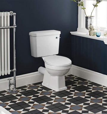Nuie Carlton traditional close coupled toilet with cistern and soft-close seat, 470x690mm, in white ceramic.