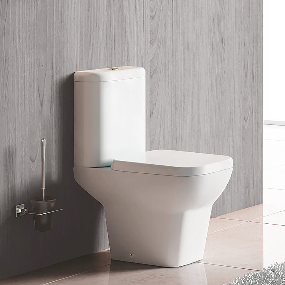 Close coupled white WC pan with cistern, open back design, 355x620mm, by Tuskan Tiles, for modern bathroom installations.