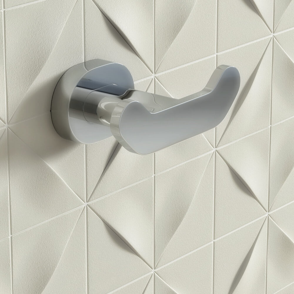 Contemporary chrome double wall hook from Vado Life by Tuskan Tiles, mounted on a wall for bathroom or entryway use.