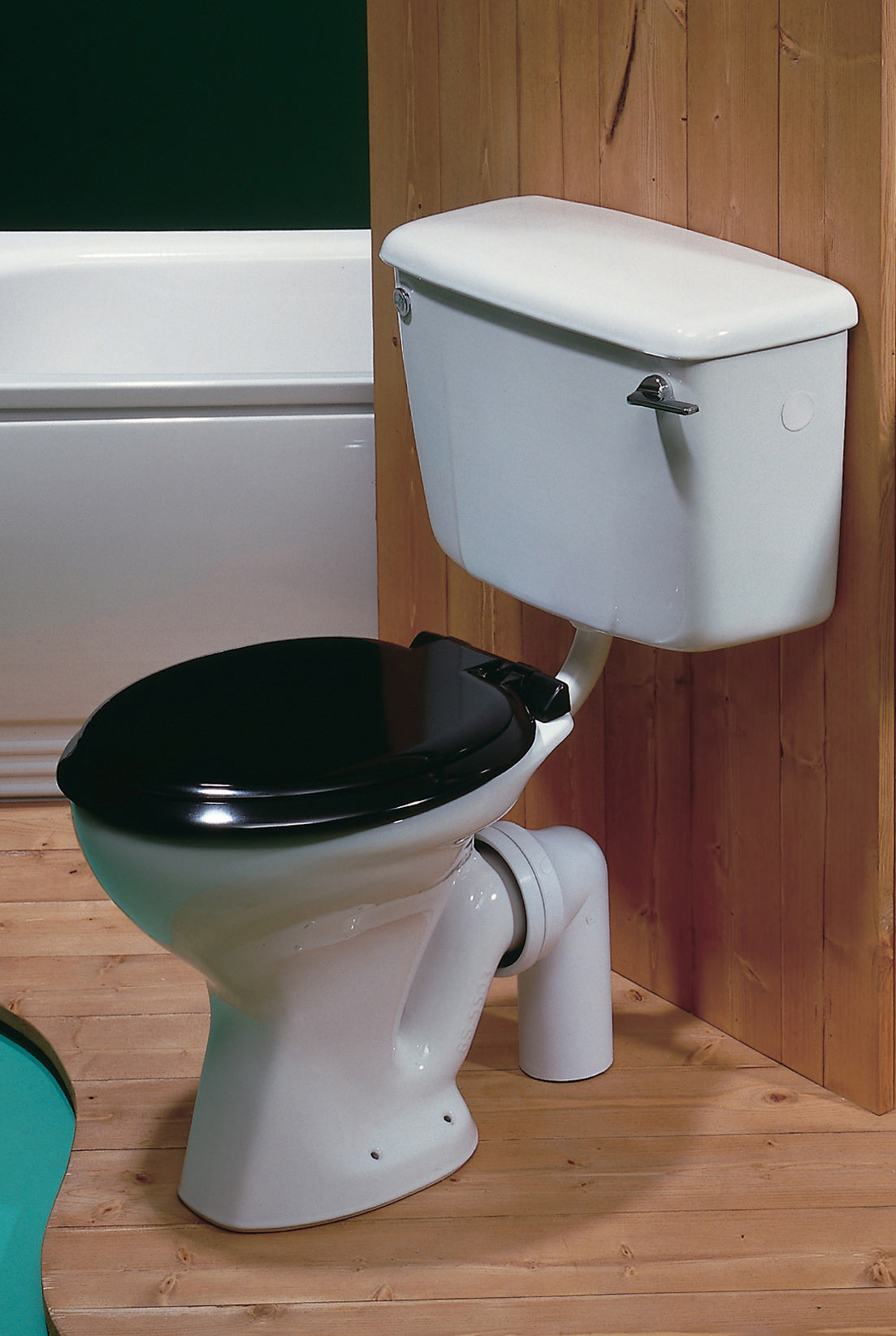 Tuskan Tiles Wyford Classic Low Level WC Pan in white with open back, measuring 355 x 455mm, shown from side view.