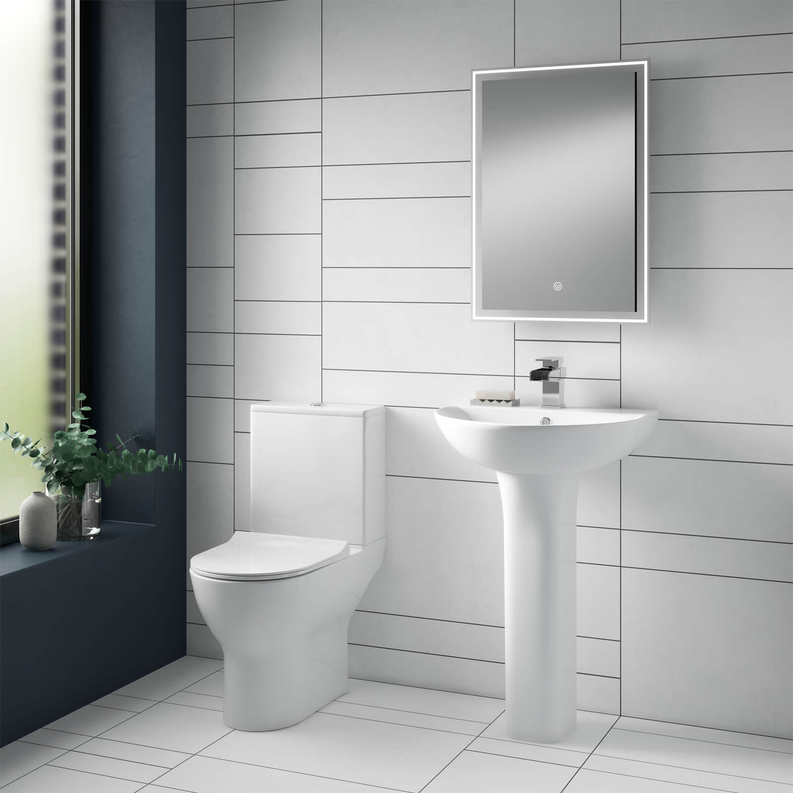 Nuie Freya compact WC pan with cistern and soft close seat, open back design, in white ceramic, measuring 375 x 610mm.