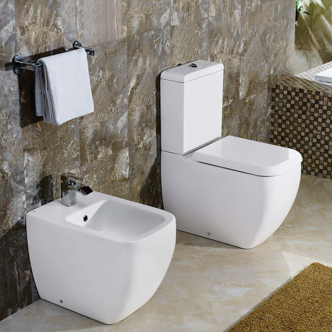 Tuskan Tiles RAK Metropolitan floorstanding back to wall bidet with 525mm projection, white ceramic bathroom fixture.