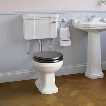 Ideal Standard Waverly low level white WC pan with cistern, traditional design, 520x645mm, shown in a bathroom setting