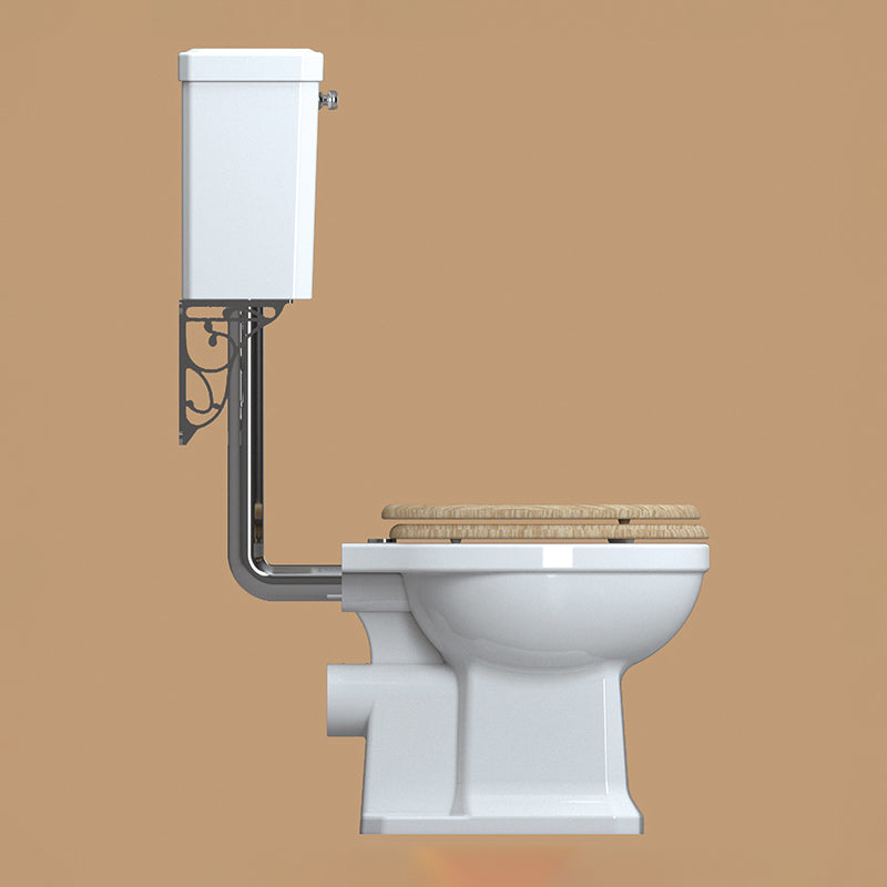 White low-level WC pan with cistern and flush pipe kit, traditional design, 520x525mm, by Tuskan Tiles.
