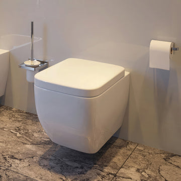 Square wall-mounted toilet by IMEX Essence, 355x470mm, with a sleek white ceramic finish and modern design.