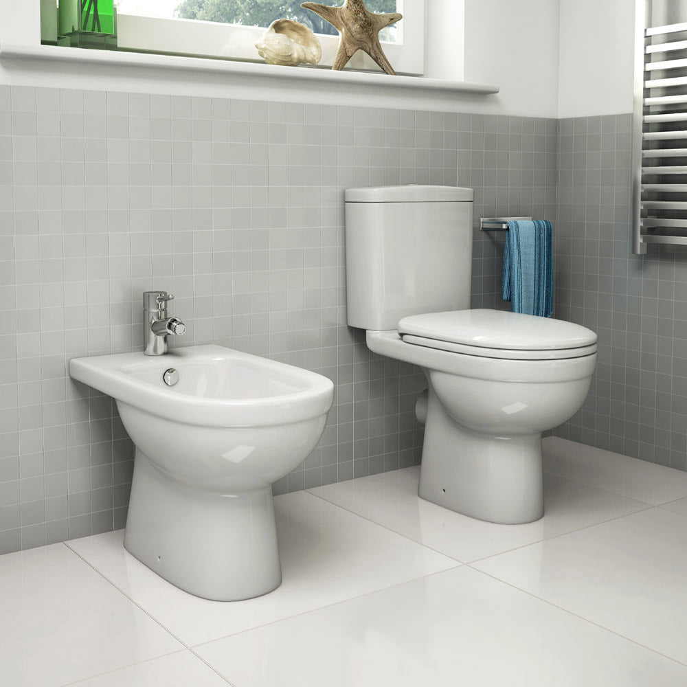 White IMEX Ivo compact close coupled WC with dual flush cistern, 355x610mm, designed for modern bathroom use