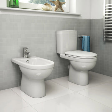 White IMEX Ivo compact close coupled WC with dual flush cistern, 355x610mm, designed for modern bathroom use