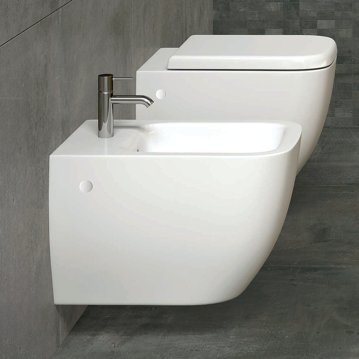 Wall hung bidet by Tuskan Tiles with one tap hole and 525mm projection, showcasing sleek modern bathroom fixture.