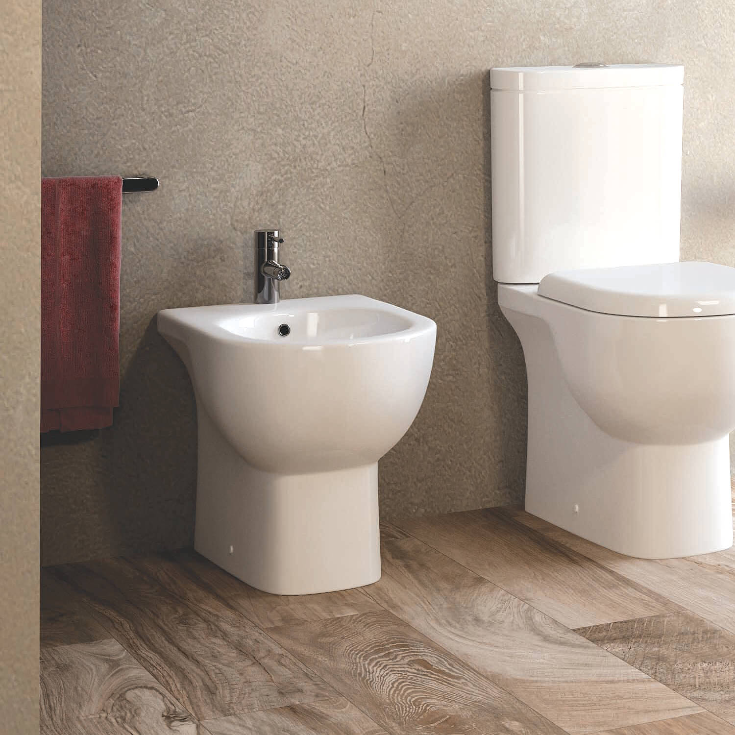 Contemporary white RAK Tonique back-to-wall bidet by Tuskan Tiles, floorstanding design with 360x550mm dimensions.