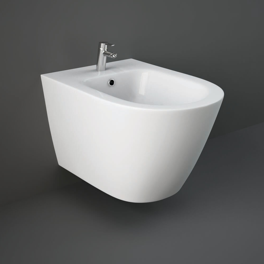 White wall-hung bidet with 520mm projection from Tuskan Tiles' RAK Resort Contemporary collection, shown in a modern bathroom setting.