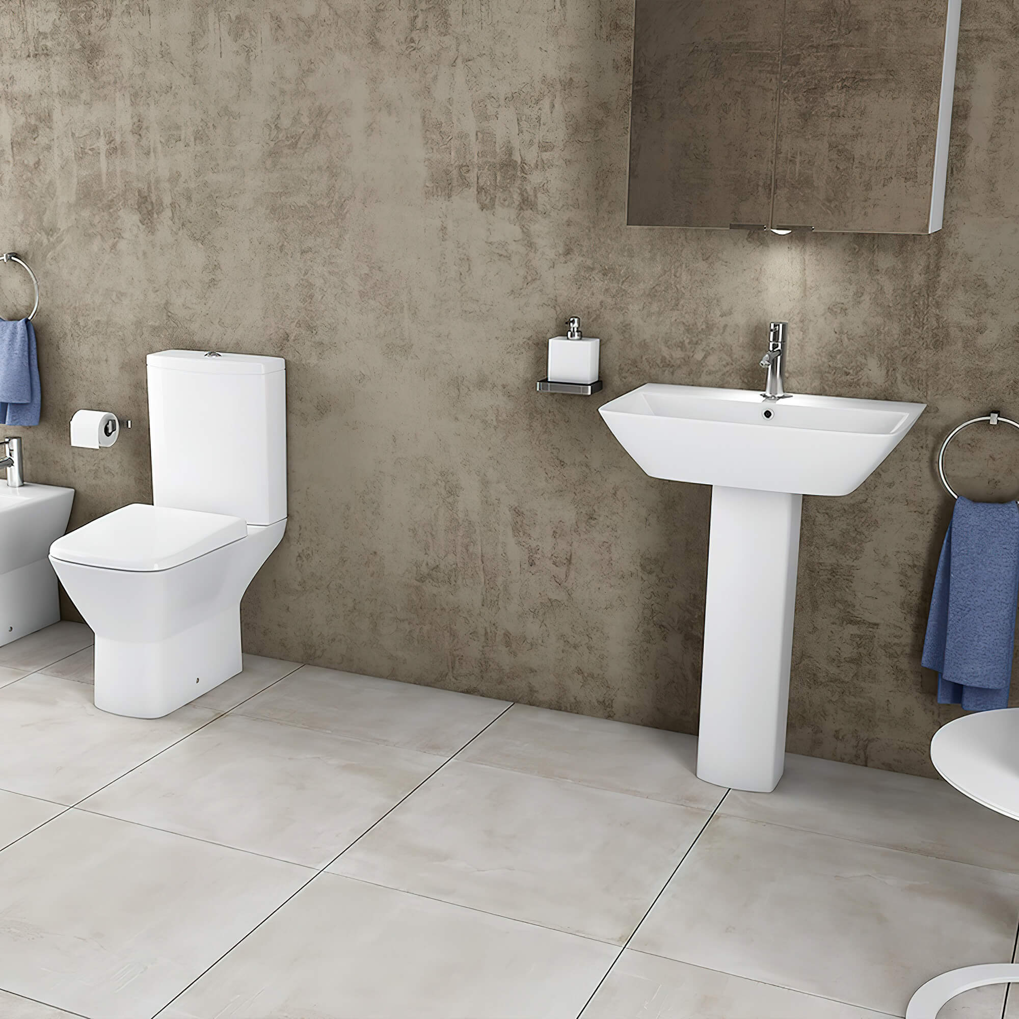 White RAK Summit compact cloakroom suite by Tuskan Tiles, featuring a modern toilet and sink with sleek design.