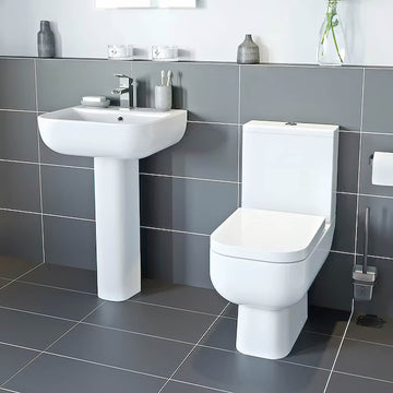 White Tuskan Tiles RAK Series-600 contemporary cloakroom suite with sleek design and modern fixtures, displayed in a clean bathroom setting.