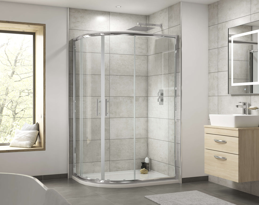 Tuskan Tiles Nuie Pacific offset quadrant shower enclosure with aluminium frame, two doors, and handle, shown from front view.