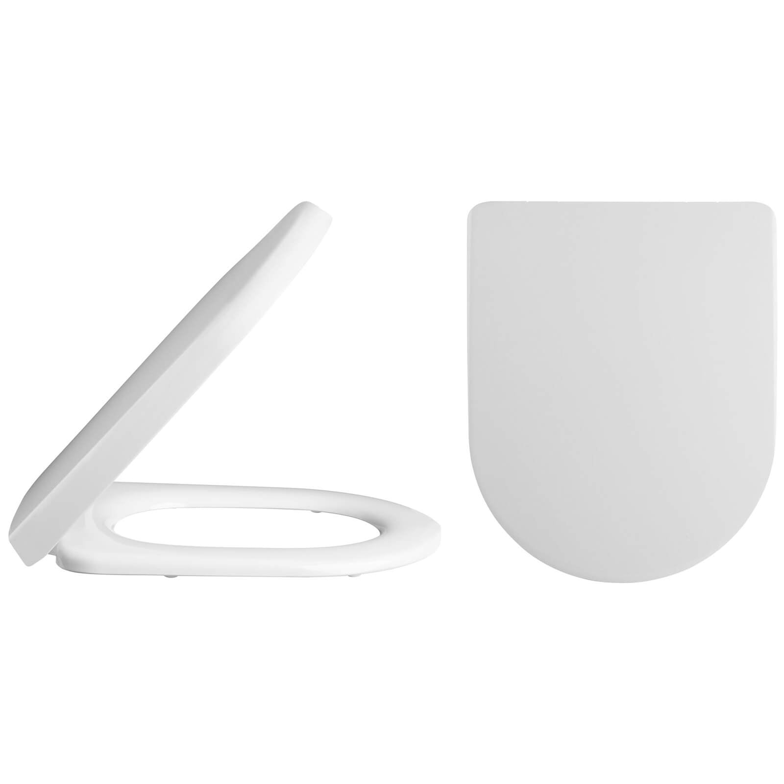 White Nuie Harmony contemporary basin and toilet pack with sleek design, featuring a modern bathroom suite by Tuskan Tiles.