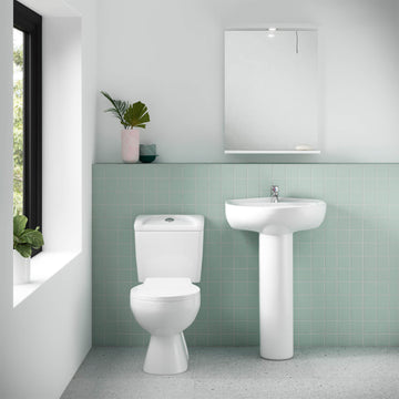 White contemporary toilet and basin pack by Tuskan Tiles, featuring sleek design and modern fixtures.