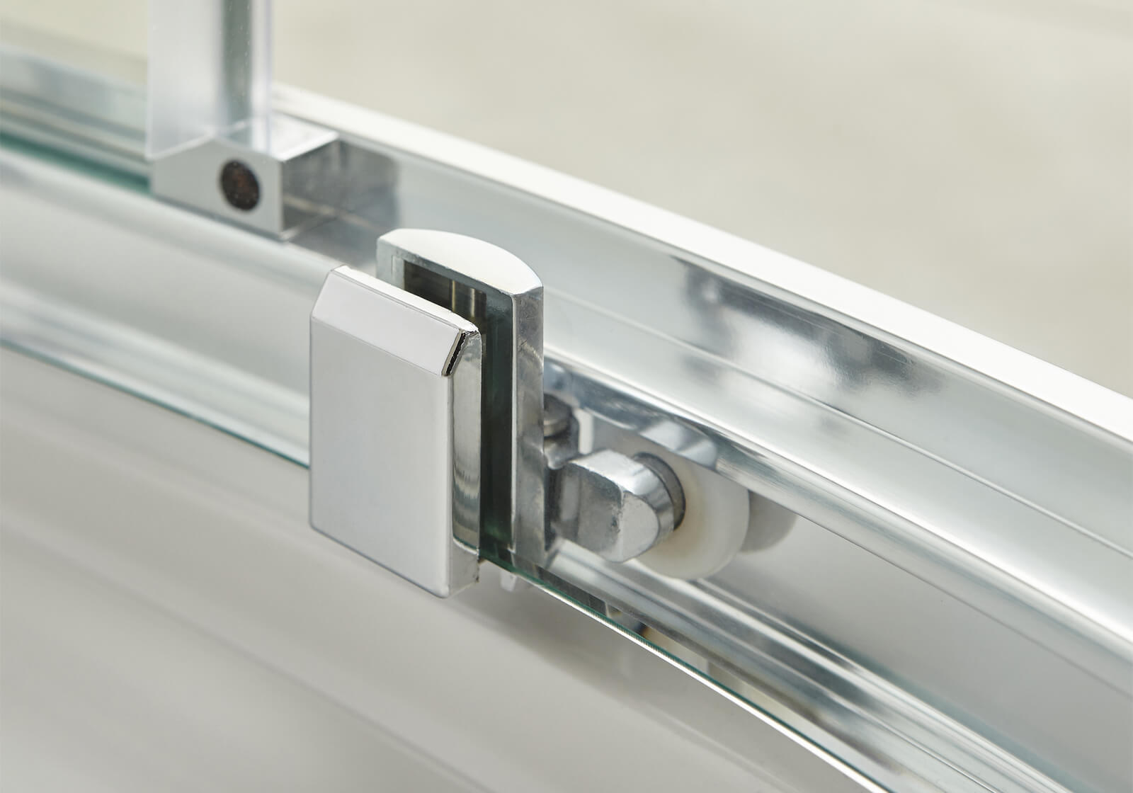 Nuie Pacific sliding quadrant shower enclosure with aluminium frame, reversible design, 860 x 860mm size, featuring clear glass panels.