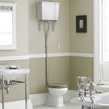 Hudson Reed Richmond high level WC pan with cistern and flush pipe kit, open back, 465mm wide, installed in a bathroom setting