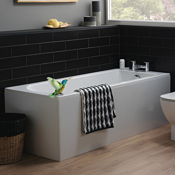 White acrylic single-ended bath from Ideal Standard Tesi Idealform Plus, shown with smooth, curved edges and a spacious interior.