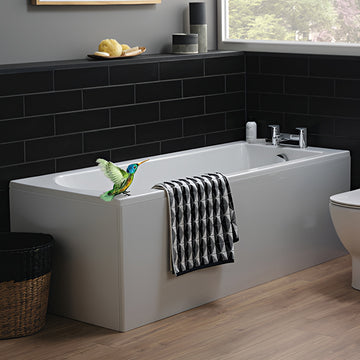 White acrylic single-ended bath from Ideal Standard Tesi Idealform Plus, shown with smooth, curved edges and a spacious interior.
