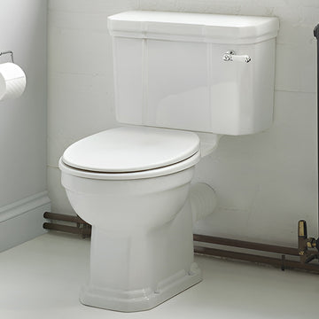White Ideal Standard Waverly traditional close coupled toilet with cistern, 520x675mm, shown in a modern bathroom setting