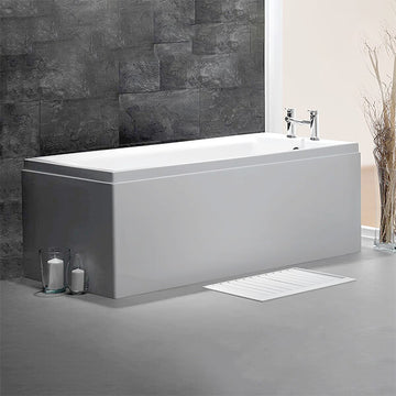 White Carron Quantum single-ended straight bath by Tuskan Tiles, 1700x700mm, made of 5mm acrylic, shown from the side view.