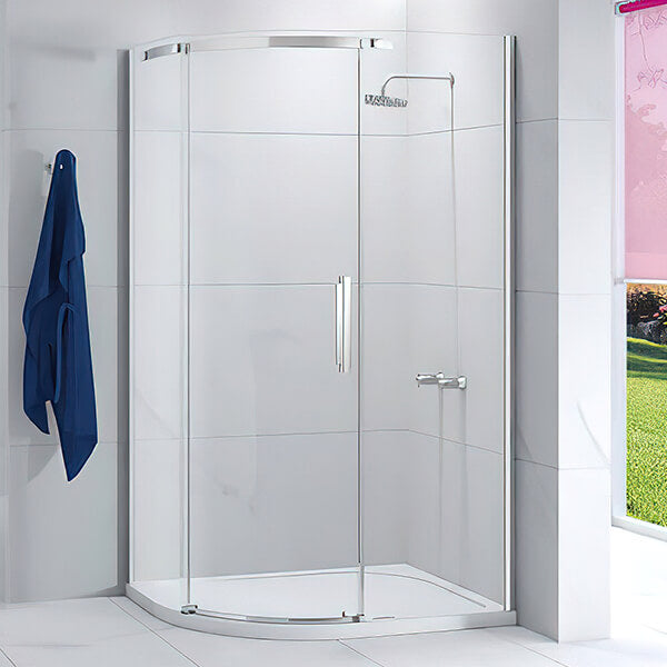 Frameless Merlyn Ionic Essence sliding offset quadrant shower enclosure in 1200x900mm with clear glass and polished chrome fittings.