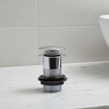 Metallic sink drain assembly on a white background