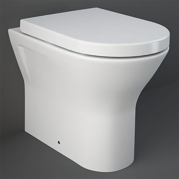 White rimless back-to-wall WC pan with soft-close seat, 360x550mm, from Tuskan Tiles RAK Resort collection.
