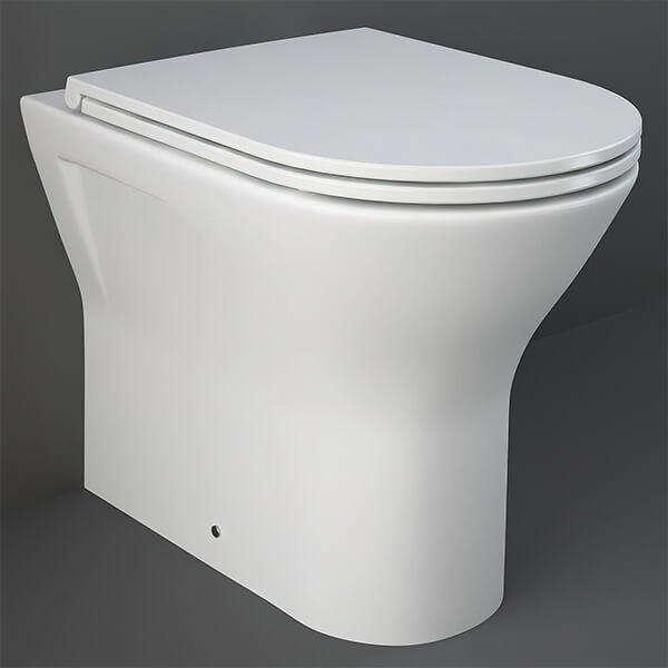 White rimless back-to-wall WC pan with soft-close seat, 360x550mm, by Tuskan Tiles, showcasing sleek bathroom fixture design.