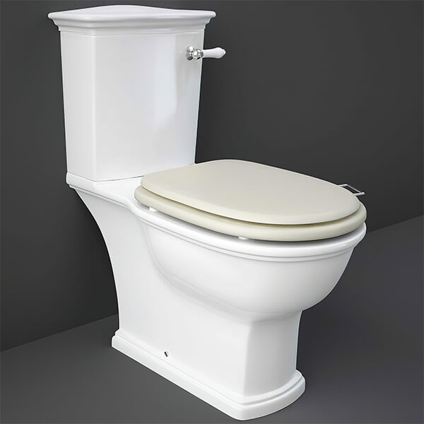 RAK Washington close coupled WC pan with cistern and soft close wooden seat, 360 x 705mm, in a modern bathroom setting