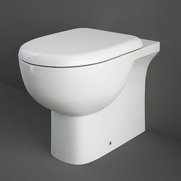 Tuskan Tiles RAK Tonique floorstanding back-to-wall WC pan with soft-close seat, 360x550mm, in a modern bathroom setting