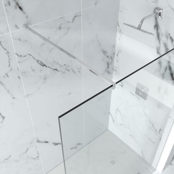 Frameless Merlyn 10-Series wetroom shower screen with chrome wall profile, reversible design, installed in a modern bathroom.