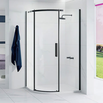 Frameless black Tuskan Tiles Merlyn Ionic Essence quadrant shower enclosure with offset design, 1200x900mm size, clear glass panels.
