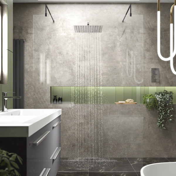 Hudson Reed frameless wetroom shower screen with black support arms and feet, 1950mm high, installed in a modern bathroom.