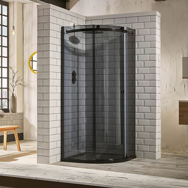 Black tinted Aquaglass Plus Sphere frameless offset quadrant shower enclosure with 8mm glass from Tuskan Tiles.