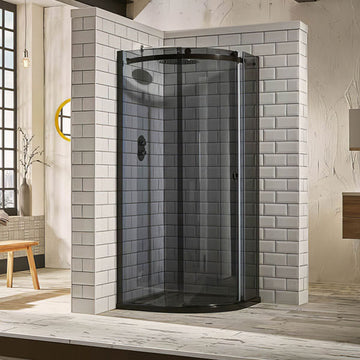 Black tinted Aquaglass Plus Sphere frameless offset quadrant shower enclosure with 8mm glass from Tuskan Tiles.