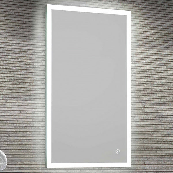 Rectangular LED mirror with border lighting, demister pad, and shaver socket by Tuskan Tiles, shown with illuminated border and reflective surface.