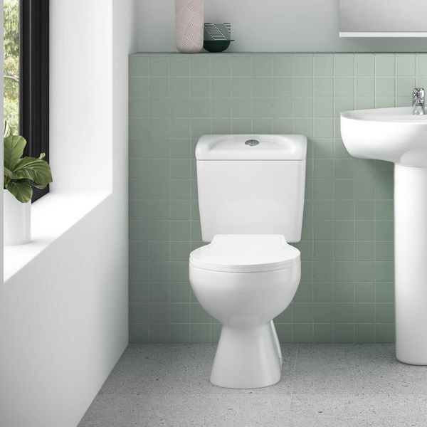 Nuie Melbourne white close coupled toilet with seat and cistern, open back, measuring 382 x 635mm, by Tuskan Tiles.