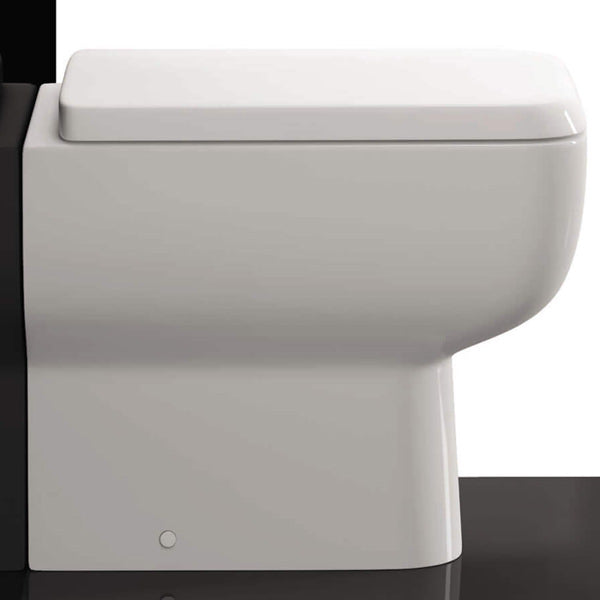 White RAK Series-600 back-to-wall WC pan with soft-close seat, 350x490mm, designed for modern bathroom installation
