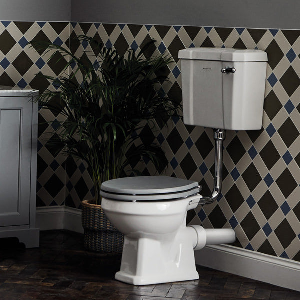 White Bayswater Fitzroy comfort height WC pan with open back and low level cistern, measuring 474 x 515mm, by Tuskan Tiles.